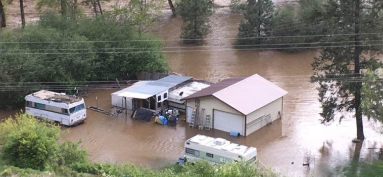 Dave McGrew Tries to Hold On Amidst Record Floods That Have Ruined His Home